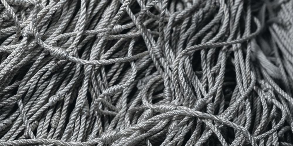 A dense tangle of pale rope filling the frame